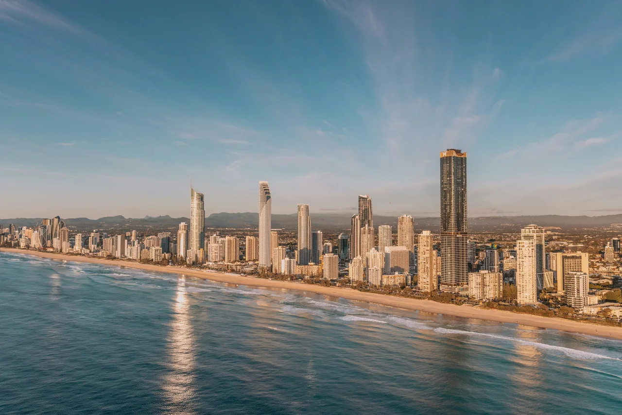 Modern Gold Coast high-rises lining the beach and ocean at sunrise