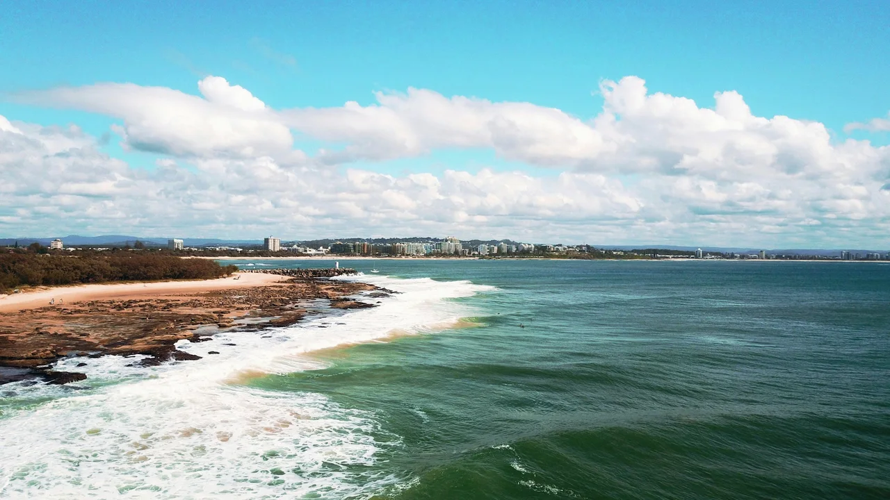 Mooloolaba coastline with buildings along the shore on the Sunshine Coast